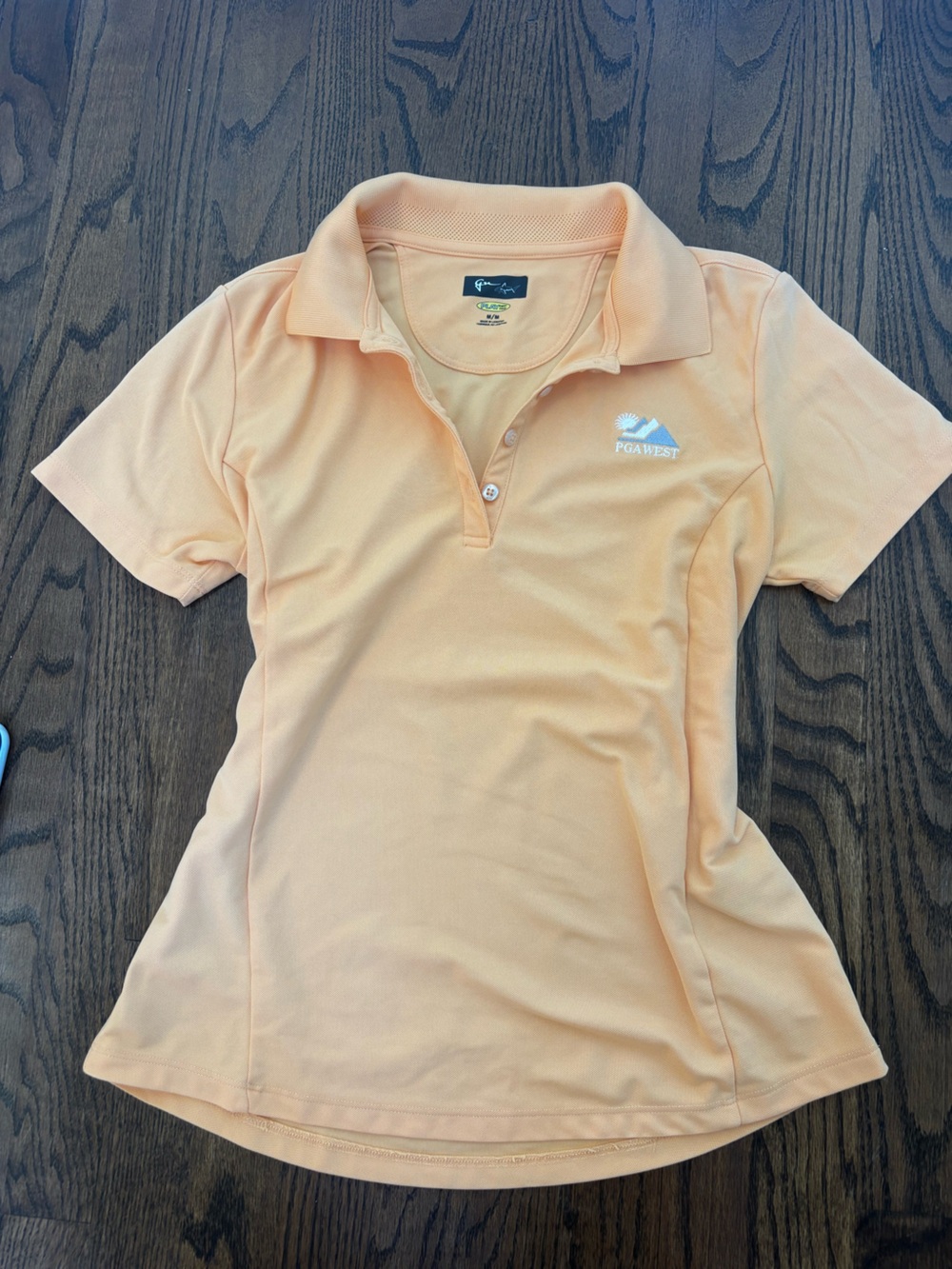 PGA WEST Peach Polo Shirt- Greg Norman Collection
